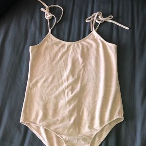 light pink suede body suit